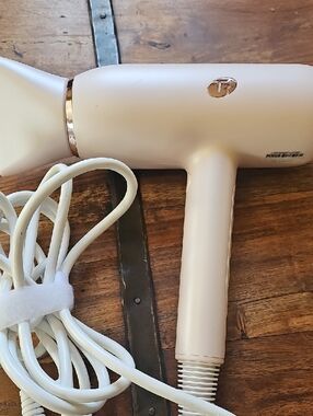 T3 Light Pink Hair Dryer with Gold Accents And Numerous Sertings